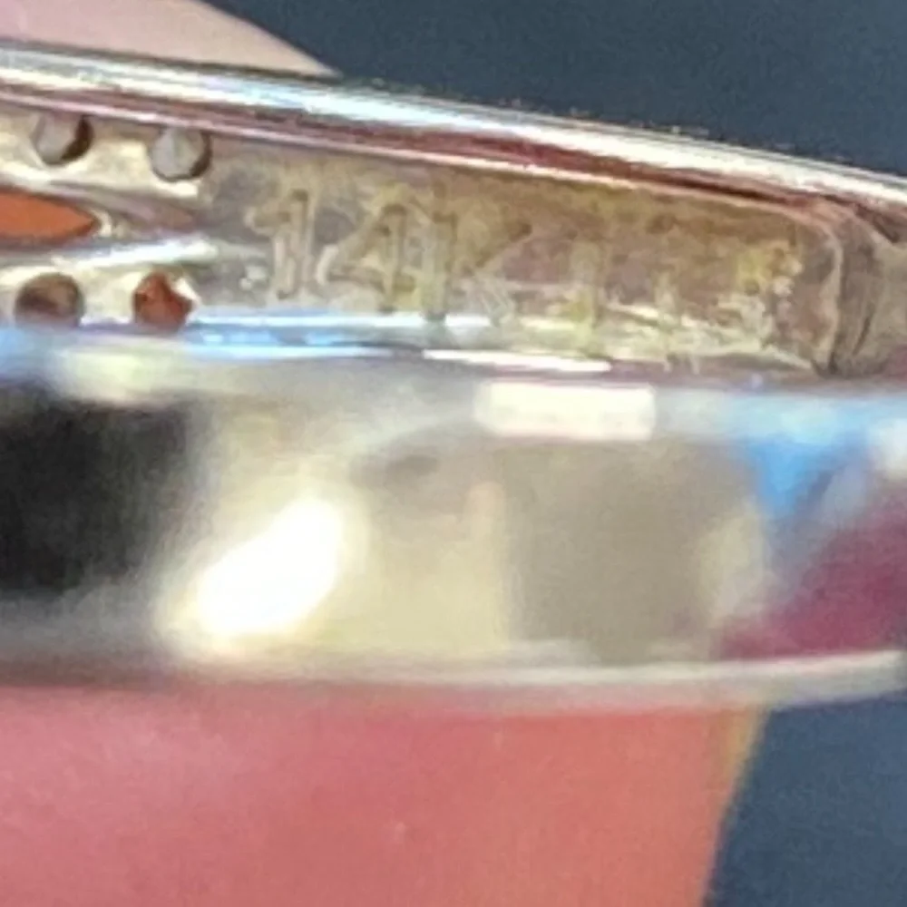 14 karat white gold lab diamond ring.